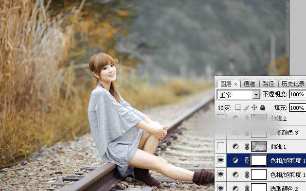 Photoshop为铁轨上的人物加上秋季淡冷色效果教程